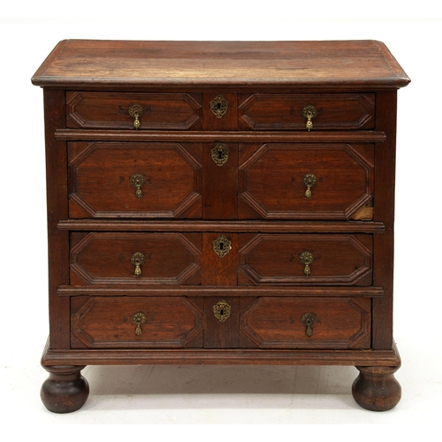 1211 - A William III geometric-moulded oak chest of four drawers, the sides panelled, on bun feet, 86cm h; ... 