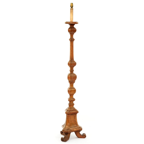 1215 - A carved and stained wood standard lamp in the form of a Baroque alter candlestick, 145cm h excludin... 