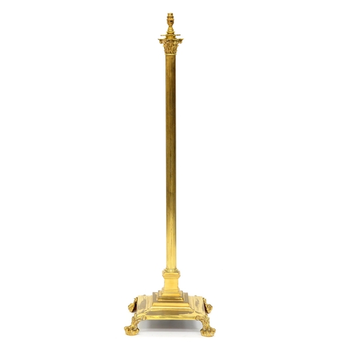 1216 - An Edwardian brass columnar telescopic oil lamp stand, on four feet, adapted for electricity, 125cm ... 