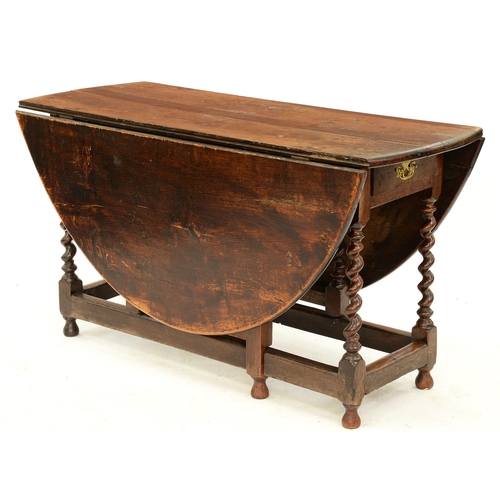 1223 - An oak and walnut gateleg table, early 18th c, 73cm h; 130 x 160cm