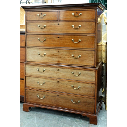 1246 - A mahogany chest on chest, early 20th c, in George III style, dentil cornice over two short and six ... 