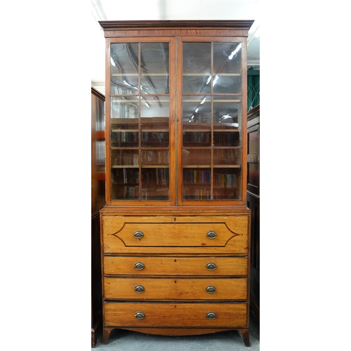 1249 - A George IV mahogany secretaire bookcase, c. 1820, the doors with glazed bars and inlaid in marquetr... 