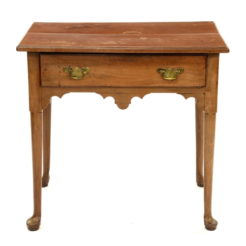 1255 - A George III walnut side table on turned legs and pad feet, 70cm h; 49 x 74cm