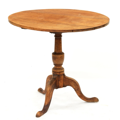 1265 - A George III tripod table, three-plank circular tilting top, vasular column, cabriole legs, 73.5cm h... 