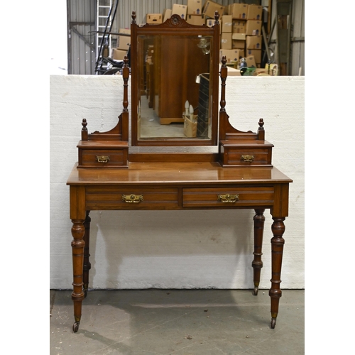 1288 - A Victorian mahogany mirror-backed washstand, with stretcher base, on turned legs and pottery castor... 