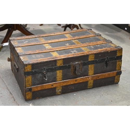 1295 - An early 20th c brass and iron mounted cabin trunk, 81cm w; 48cm x 31cm