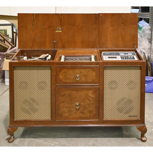 1298 - A Dynatron Stereogram, with Technics stereo cassette deck, in walnut cabinet, 83cm h; 129cm x 41cm... 