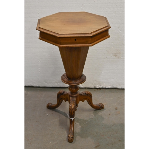 1299 - A Victorian carved mahogany octagonal work table, 75cm x 45cm