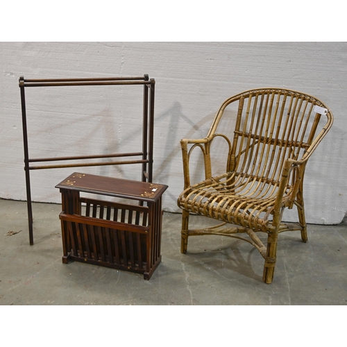 1304 - A bamboo elbow chair, c1970s, a brass inlaid canterbury and Victorian mahogany towel rail... 