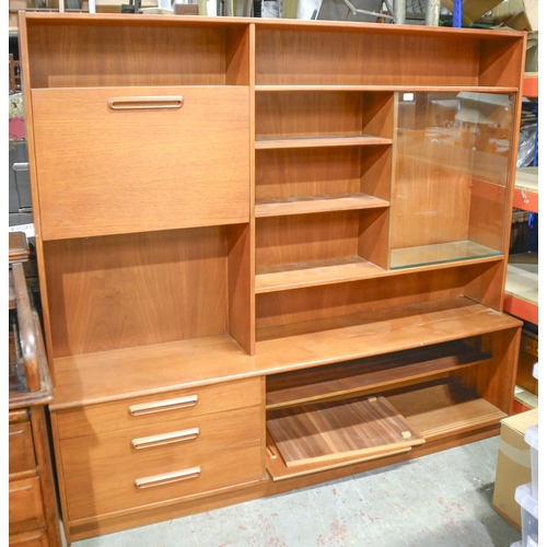 1312 - A mid century modern teak wall unit, 1960's, 166cm h, 43 x 183cm