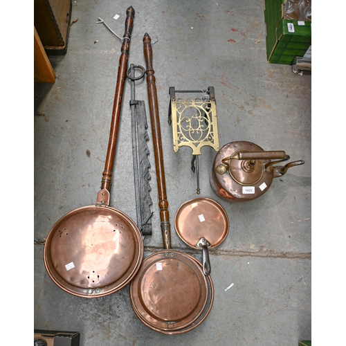 1422 - A Victorian pierced brass and iron trivet, contemporary copper kettle and warming pans, etc... 