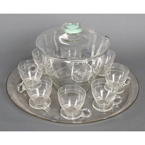 1425 - A glass punch set, mid 20th c, comprising punch bowl and cover, ladle, eight cups and tray, tray 44c... 