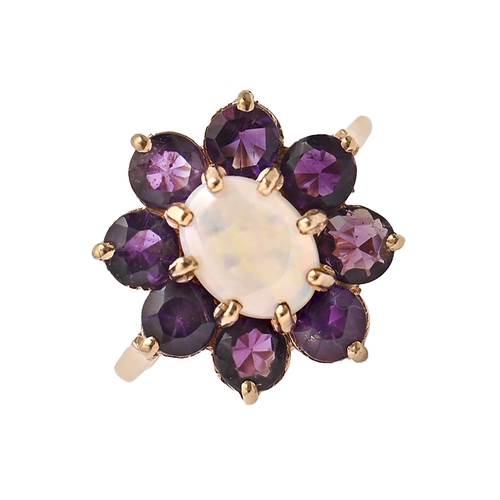 159 - An opal and amethyst ring in 9ct gold, London 1977, 3.4g, size J