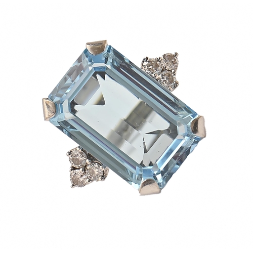 162 - A blue topaz and diamond ring in 18ct white gold, topaz 12mm x 18mm London 1982 9.6g, size I... 