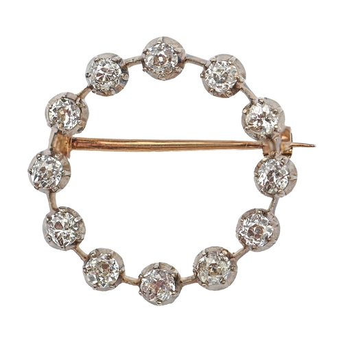 179 - A diamond circlet brooch, late 19th c, the old cut diamonds mounted in silver and gold, 24mm diam, 4... 