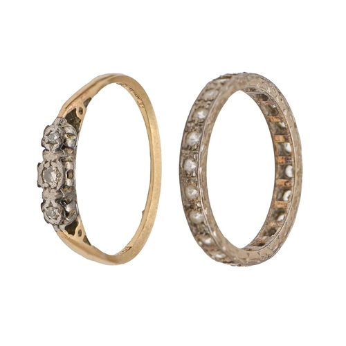 183 - A diamond ring, illusion set, gold hoop marked 18ct PLAT, and a white stone eternity ring, in gold m... 