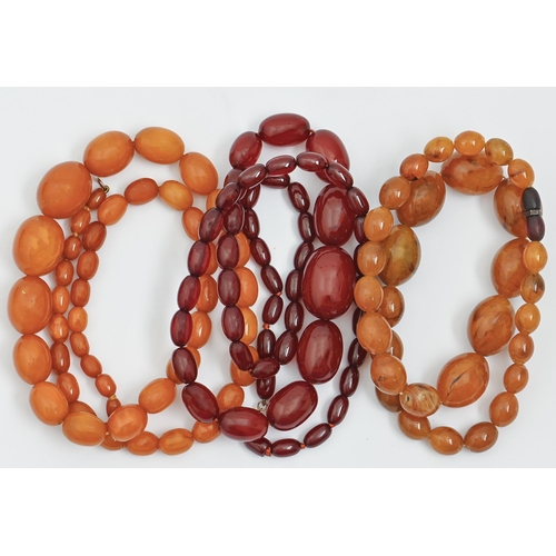 248 - A necklace of Faturan beads, and two others, 175g