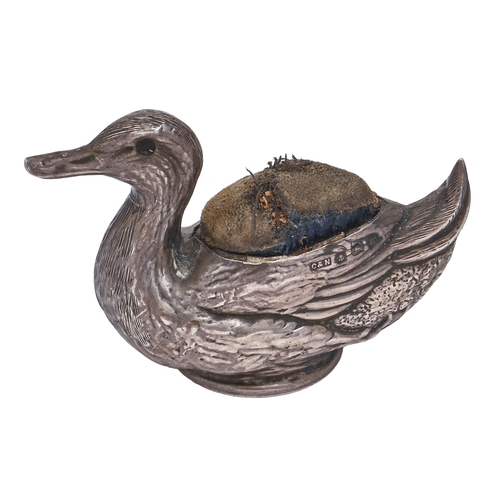 265 - A George V silver duck novelty pin cushion, 57mm l, by Crisford & Norris Birmingham 1911... 