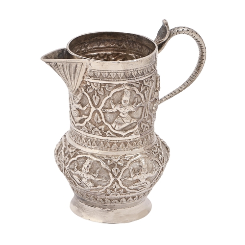 312 - An Indian silver repousse cream jug, late 19th c, with cobra handle, 12cm h, 4oz 11dwt... 