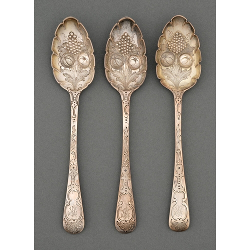 322 - Three George III and George IV silver table spoons, later chased as a set of berry spoons, by variou... 