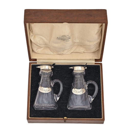 337 - A pair of George V silver mounted glass whisky noggins, 12cm h, by H B Johnson & Co, Birmingham ... 