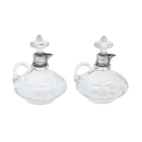 344 - A pair of Edwardian silver mounted brilliant cut glass flagon decanters, stoppers, 15cm h, by Thomas... 