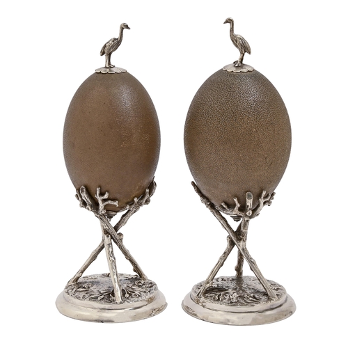 361 - A pair of EPNS mounted emu eggs, possibly Australian,  late 19th c, on tripod tree branch base, with... 