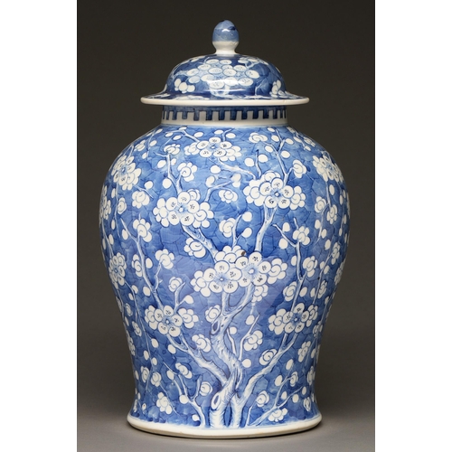 390 - A Chinese blue and white ginger jar and a cover, 19th c, painted with prunus on a cracked ice ground... 