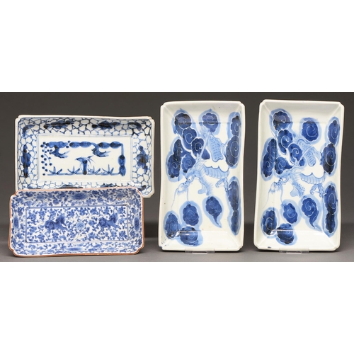 393 - One and a pair of Chinese blue and white dishes, late 19th c, painted with a dragon or landscape, 20... 