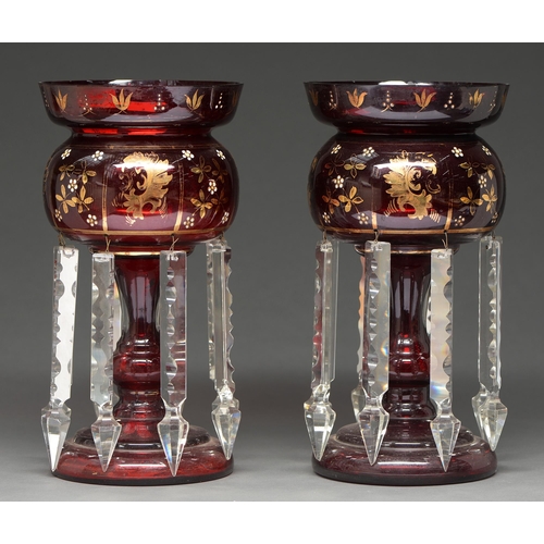 397 - A pair of ruby flashed gilt and white enamel glass lustres, late 19th c,  hung with prismatic c... 