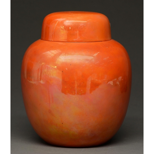 398 - A Ruskin pottery ginger jar and cover, c1925,  in iridescent orange glaze, 22cm h, impressed mark... 