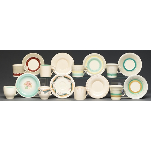 402 - Eight Susie Cooper coffee cans and saucers, c.1932-1956, largest saucer 12.1cm diam, printed marks (... 