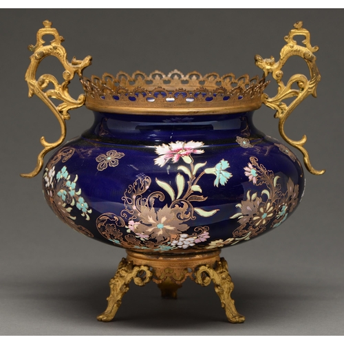 441 - A French Japanesque jardinere, c.1880, with two gilt brass dragon handles, the three feet moulded wi... 