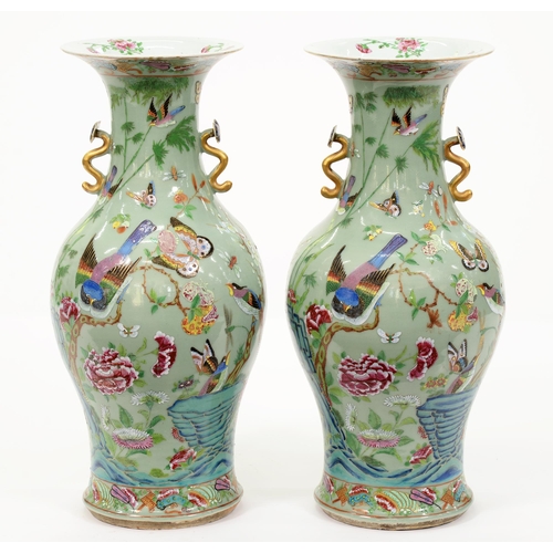 447 - A pair of Chinese celadon ground Canton famille rose vases, second half 19th c, with ruyi sceptre ha... 