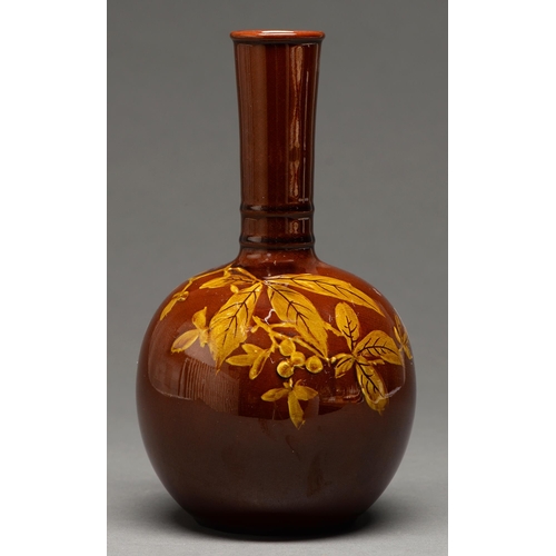 448 - A slipware terracotta bottle vase, first half 20th c, painted with leaves and berries, 22cm h, indis... 