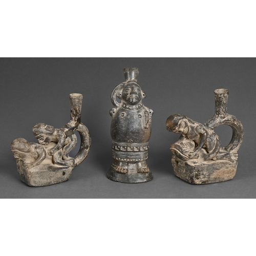 453 - Three South American carved earthenware drinking vessels, second half of 20th c, 24cm h (3)... 