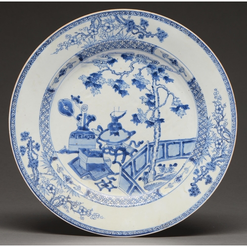 472 - A Chinese export blue and white charger, 18th c, painted with auspicious objects beneath a maple tre... 