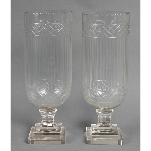 473 - A pair of cut glass lamps on square bases, early 20th century, 40cm h (2)