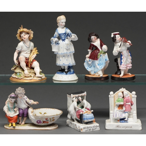 478 - Seven porcelain figures and groups, 19th/20th c, including Dresden, Capodimonte, and fairings (7)... 