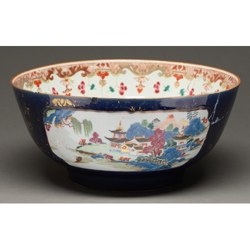 482 - A Chinese porcelain export famille rose punch bowl, 18th c, painted with scenes reserved on a gilt c... 