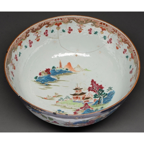 482 - A Chinese porcelain export famille rose punch bowl, 18th c, painted with scenes reserved on a gilt c... 