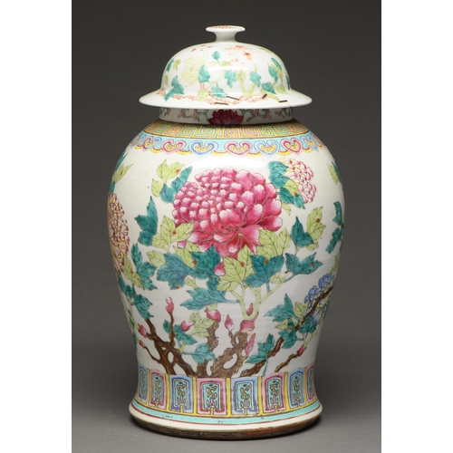 483 - A Chinese famille rose vase and associated cover, early 19th century, enamelled with peony branches,... 