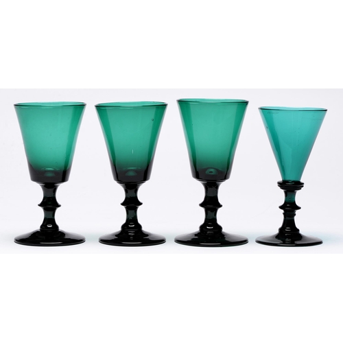 490 - One and a set of three Victorian green glass goblets,  13cm h and c