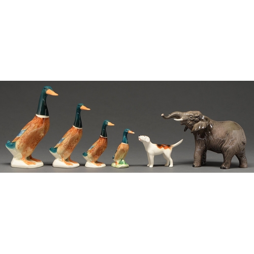 501 - Four Beswick earthenware animals,  comprising four graduated ducks, hound and elephant, largest... 