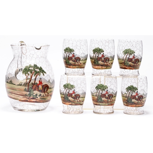 529 - A glass jug and set of six glasses printed and painted with fox hunting scenes, first half of 19th c... 