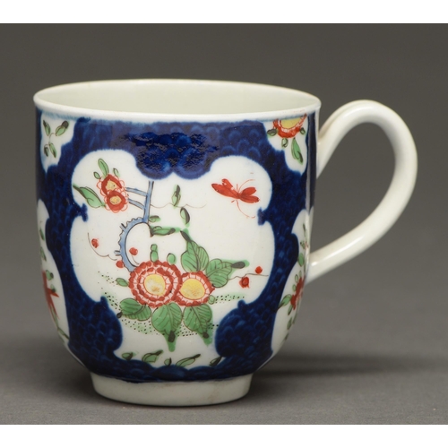 540 - A Worcester scale blue ground kakiemon coffee cup, c1770,  6.5cm h, fretted square in underglaz... 