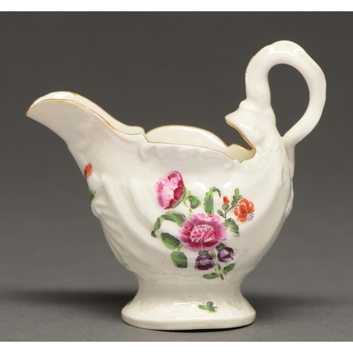 541 - A Worcester Dolphin ewer, c1770, painted with flowers, 8.5cm h