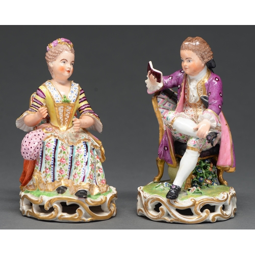 549 - A pair of Derby figures of seated boy and girl, c1830 or of a lady and gallant in colourful 18th c s... 