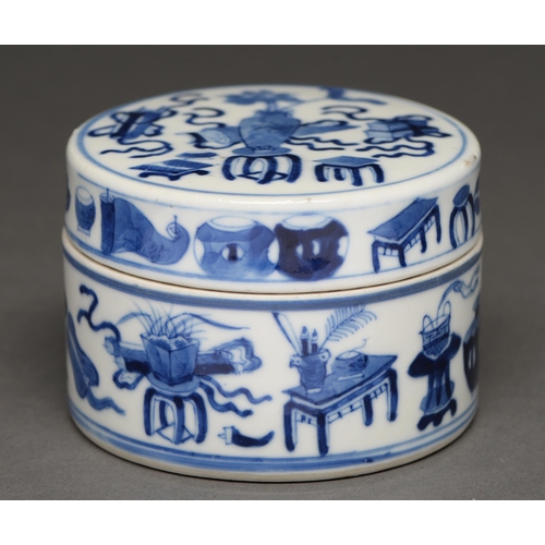 558 - A Chinese blue and white box and cover, late 19th/early 20th c, painted with auspicious objects, 6.8... 