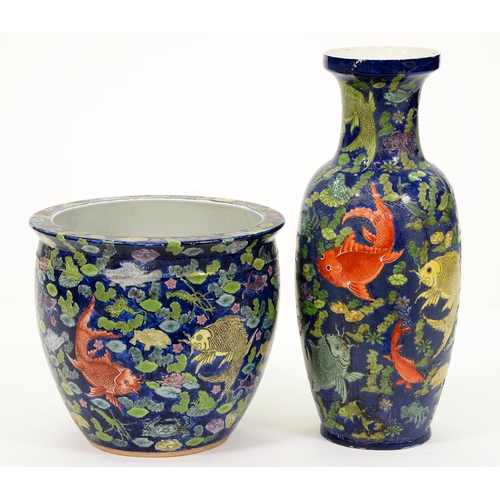 571 - A Chinese fishbowl and floor vase painted with catfish and other pond life on a cobalt blue ground, ... 